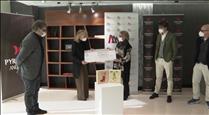 Pyrénées i el Carmen Thyssen lliuren un xec de 2.905 euros a l'Escola de Meritxell provinent del projecte col·lecció Art Cru