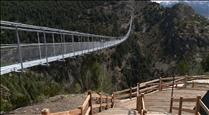 Canillo vol conèixer l'opinió de turistes i comerciants sobre el pont tibetà i el roc del Quer